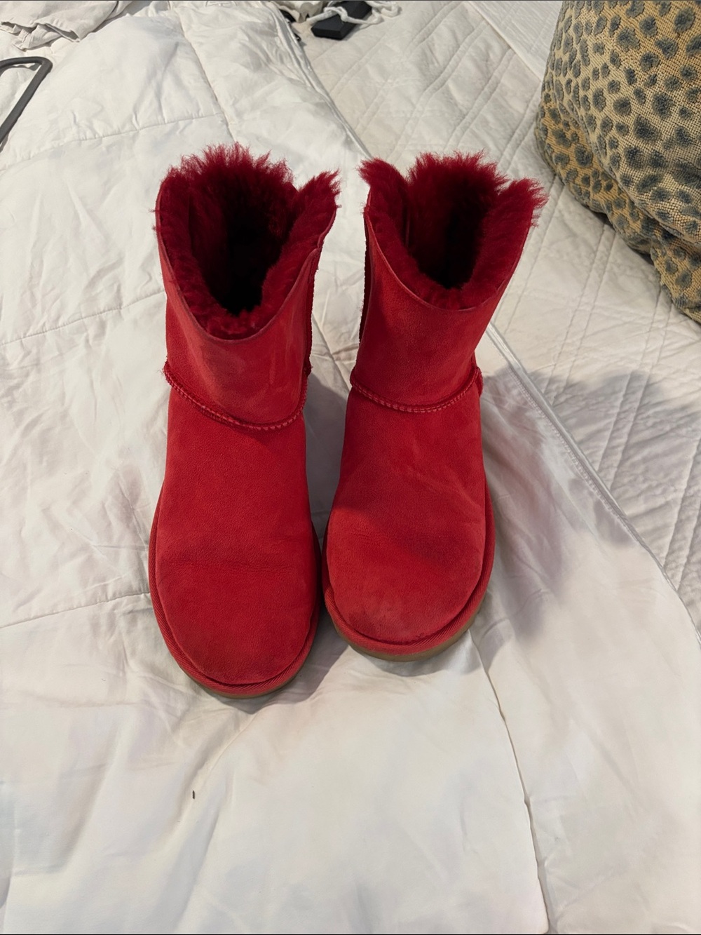 UGG Women's Short Shearling Boots in Red. Size 7.